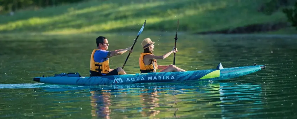 XtremeMarine Homepage — Browser Review Revision 2026 1 Two paddlers exploring calm water in an Aqua Marina STEAM double kayak