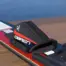 Close-up of a rear toe plate on a celebrity ski on a dock