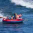 Two riders using the O’Brien 2026 Super Screamer boat tube