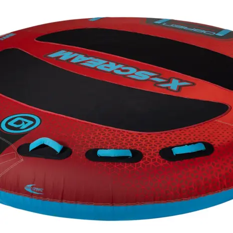 Obrien X Scream Boat Tube Detail 02 Angled view of X-Scream towable tube with red deck, black pads, and multiple blue handles.