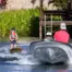 O’Brien 2026 Platform Trainer Waterski – Red/Blue – on-water lifestyle image