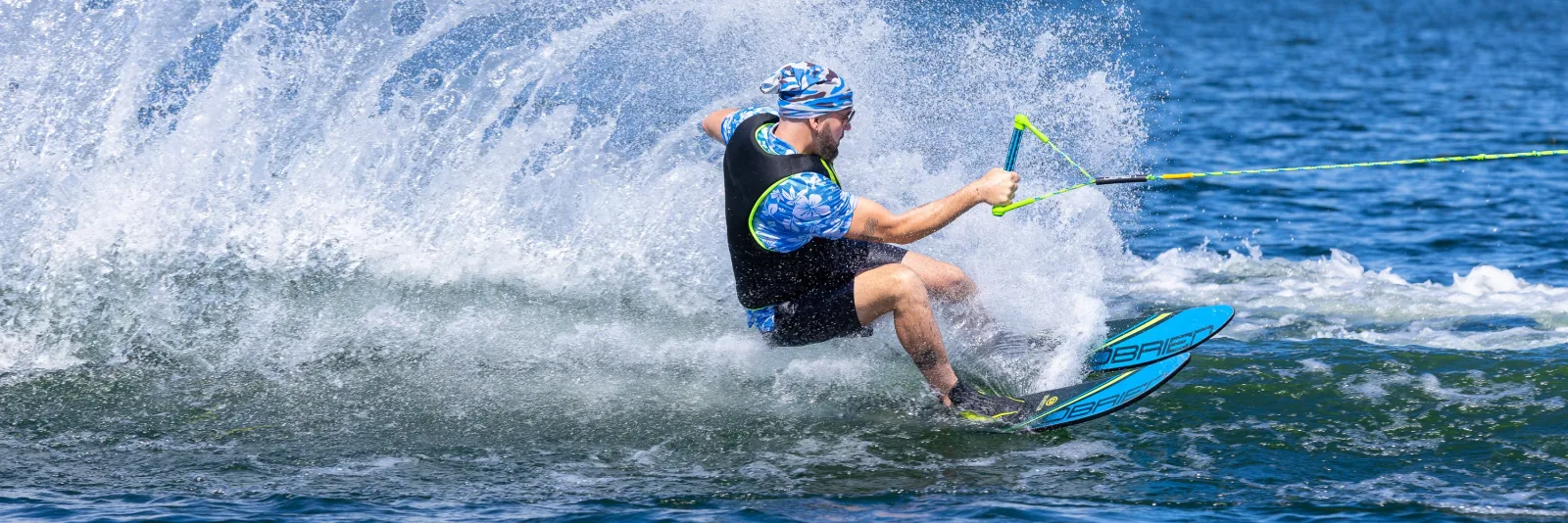 O’Brien waterskier carving across open water