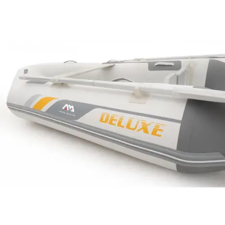 Aqua Marina A-DELUXE inflatable boat - close-up of the side tube and oar Aqua Marina A-DELUXE inflatable boat - close-up of the side tube and oar