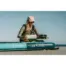 Aqua Marina BlueDrive X - propulsion unit held beside a paddle board