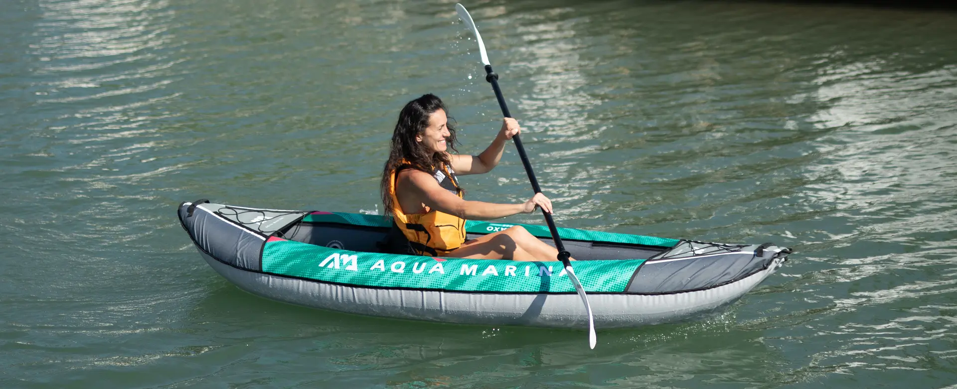 Aqua Marina LAXO 285 9′4″ Single Kayak 1 Aqua Marina LAXO 285 - paddler in a single kayak on the water
