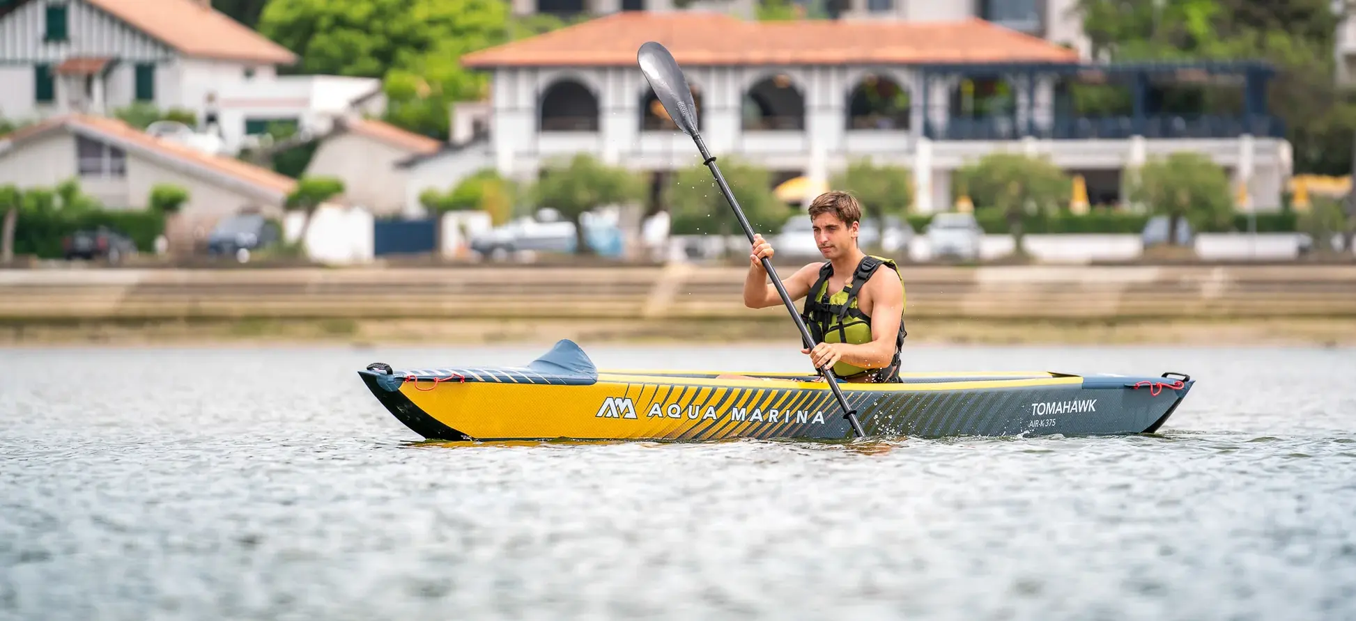 Aqua Marina TOMAHAWK AIR-K 375 Single Kayak 1 Aqua Marina TOMAHAWK AIR-K - single paddler in a kayak on the water