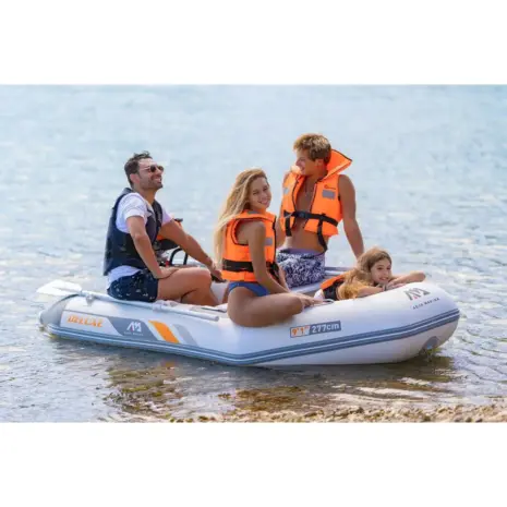 Aqua Marina U-DELUXE - four people seated in the boat on the water Aqua Marina U-DELUXE - four people seated in the boat on the water